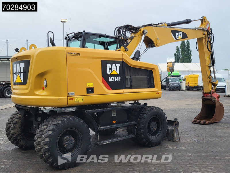 Caterpillar M314 F - Gumikerekes kotró: 5 kép. Caterpillar M314 F - Gumikerekes kotró: 5 kép.