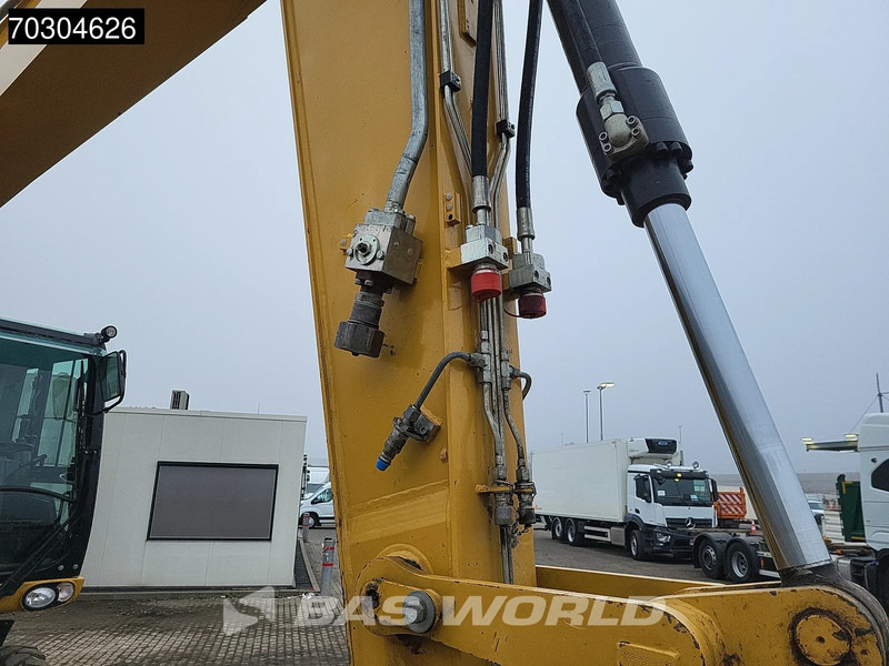 Gumikerekes kotró Caterpillar M316 D: 14 kép. Gumikerekes kotró Caterpillar M316 D: 14 kép.