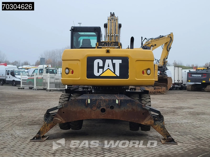 Gumikerekes kotró Caterpillar M316 D: 6 kép. Gumikerekes kotró Caterpillar M316 D: 6 kép.