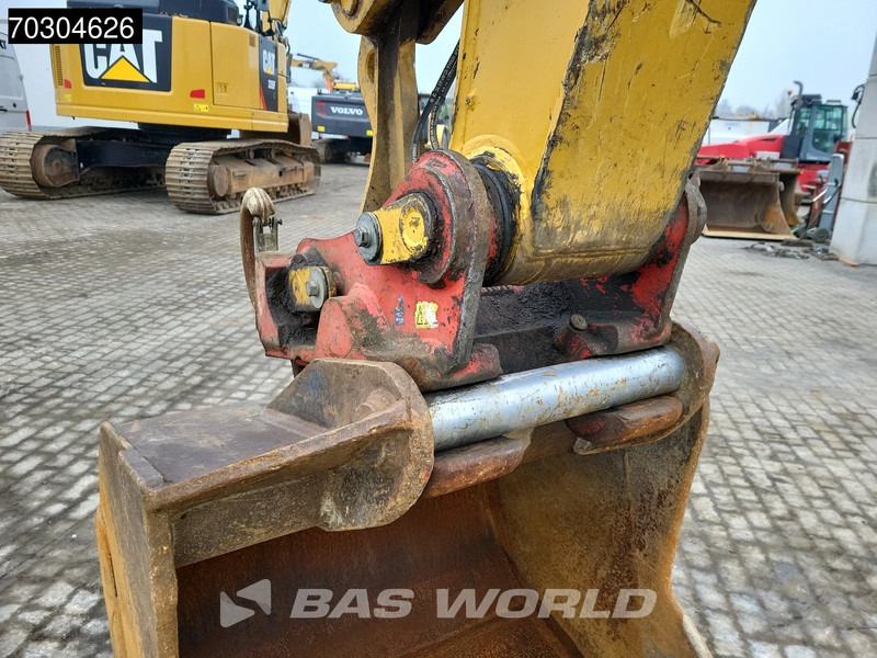 Gumikerekes kotró Caterpillar M316 D: 15 kép. Gumikerekes kotró Caterpillar M316 D: 15 kép.