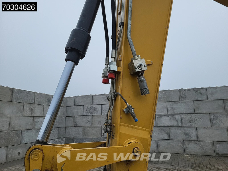 Gumikerekes kotró Caterpillar M316 D: 13 kép. Gumikerekes kotró Caterpillar M316 D: 13 kép.