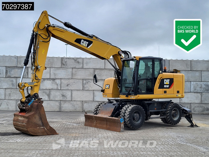 Caterpillar M316 F M316F OUTRIGGERS + BLADE - Gumikerekes kotró: 1 kép. Caterpillar M316 F M316F OUTRIGGERS + BLADE - Gumikerekes kotró: 1 kép.
