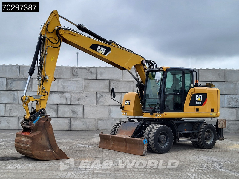 Caterpillar M316 F M316F OUTRIGGERS + BLADE - Gumikerekes kotró: 2 kép. Caterpillar M316 F M316F OUTRIGGERS + BLADE - Gumikerekes kotró: 2 kép.
