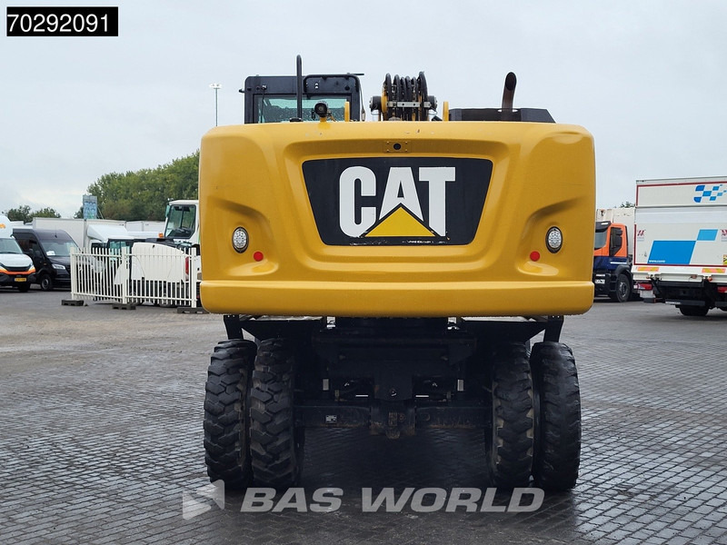 Caterpillar M320 F - Gumikerekes kotró: 3 kép. Caterpillar M320 F - Gumikerekes kotró: 3 kép.