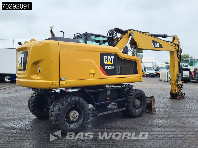 Caterpillar M320 F - Gumikerekes kotró: 5 kép. Caterpillar M320 F - Gumikerekes kotró: 5 kép.