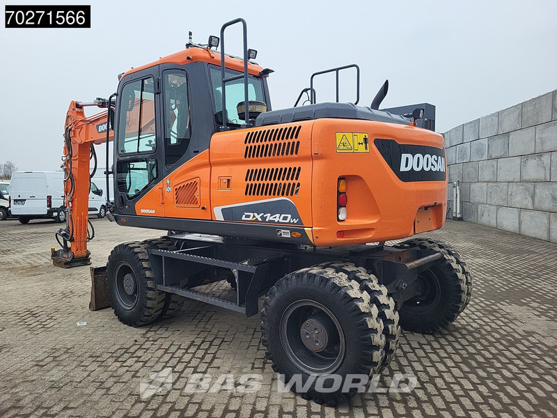 Doosan DX140 W-5 OIL QUICK - GERMAN - Gumikerekes kotró: 2 kép. Doosan DX140 W-5 OIL QUICK - GERMAN - Gumikerekes kotró: 2 kép.