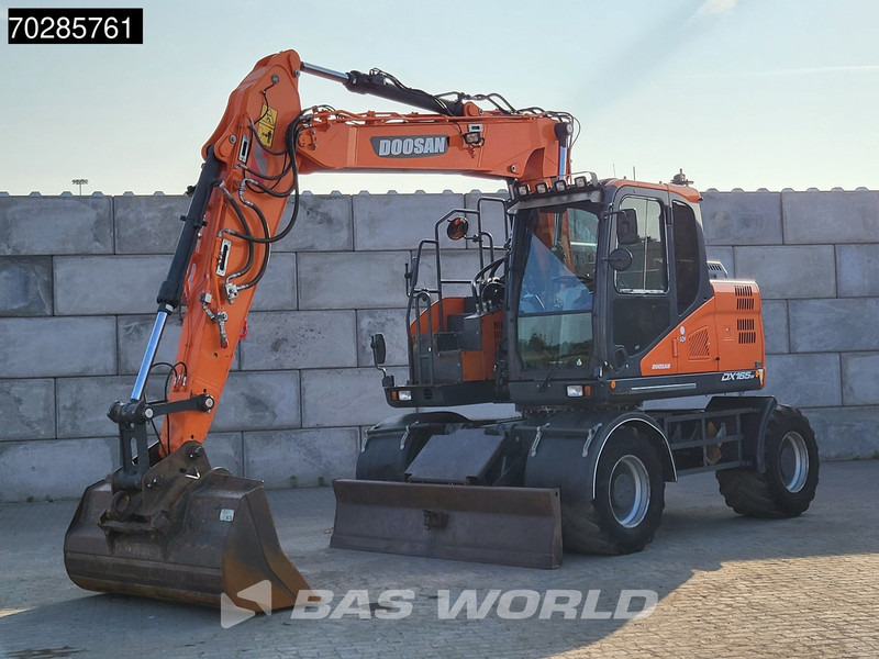 Doosan DX165W-5 DUTCH MACHINE - Gumikerekes kotró: 2 kép. Doosan DX165W-5 DUTCH MACHINE - Gumikerekes kotró: 2 kép.