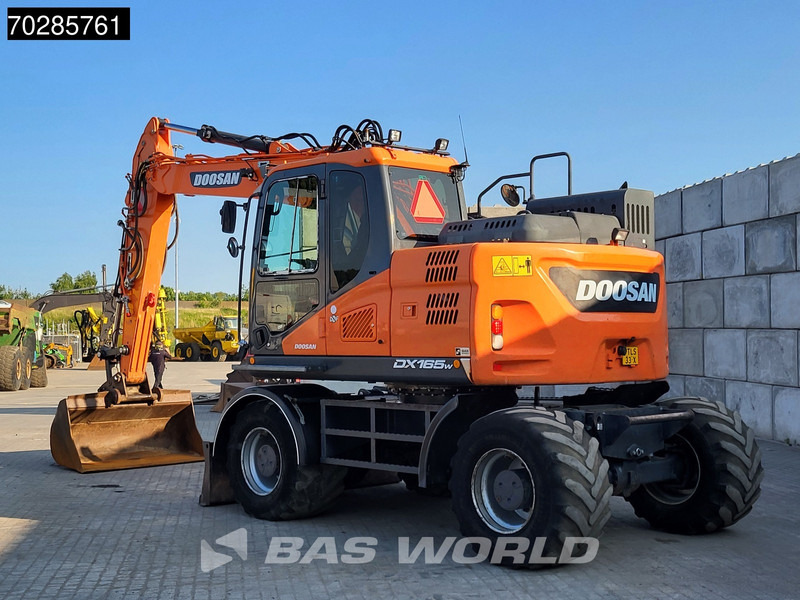 Doosan DX165W-5 DUTCH MACHINE - Gumikerekes kotró: 3 kép. Doosan DX165W-5 DUTCH MACHINE - Gumikerekes kotró: 3 kép.