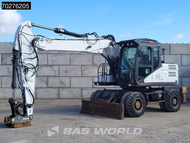 Doosan DX170 W-5 BLADE + OUTRIGGERS - Gumikerekes kotró: 2 kép. Doosan DX170 W-5 BLADE + OUTRIGGERS - Gumikerekes kotró: 2 kép.