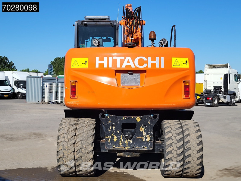 Hitachi ZX140W -3 - Gumikerekes kotró: 5 kép. Hitachi ZX140W -3 - Gumikerekes kotró: 5 kép.