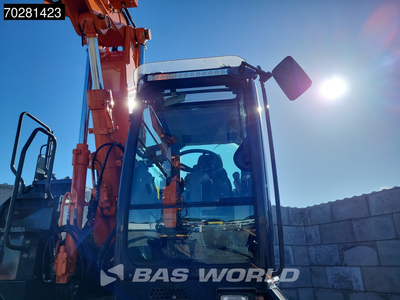 Gumikerekes kotró Hitachi ZX140W -5 OUTRIGGERS + BLADE: 20 kép.