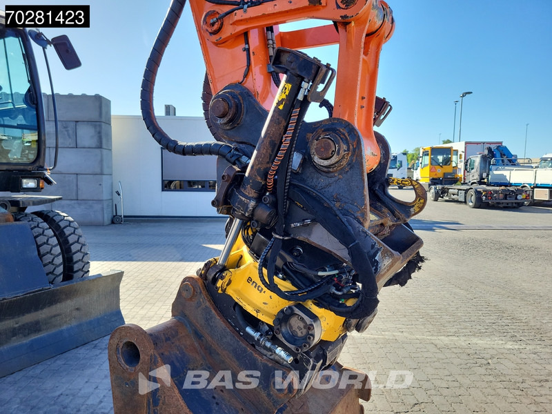 Gumikerekes kotró Hitachi ZX140W -5 OUTRIGGERS + BLADE: 11 kép.