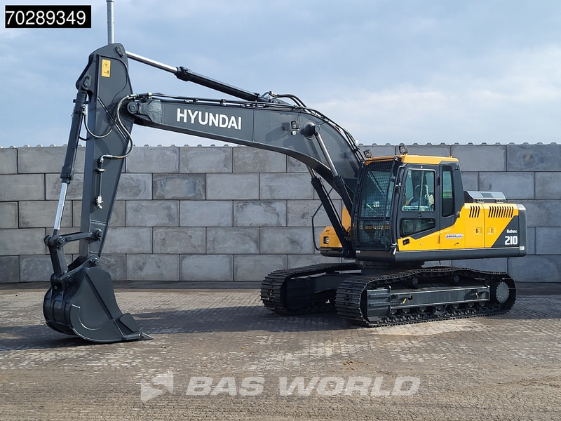 Hyundai R210 - Lánctalpas kotró: 2 kép. Hyundai R210 - Lánctalpas kotró: 2 kép.