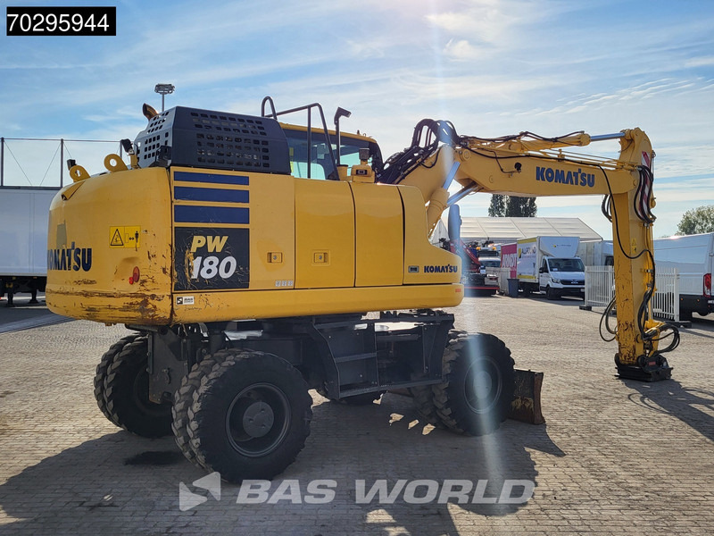 Komatsu PW180 -11 - Gumikerekes kotró: 5 kép. Komatsu PW180 -11 - Gumikerekes kotró: 5 kép.