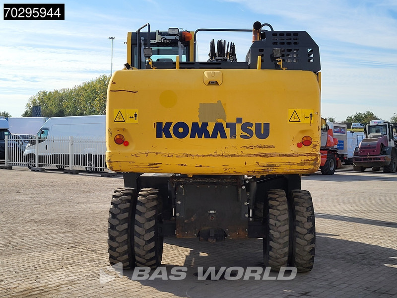 Komatsu PW180 -11 - Gumikerekes kotró: 3 kép. Komatsu PW180 -11 - Gumikerekes kotró: 3 kép.