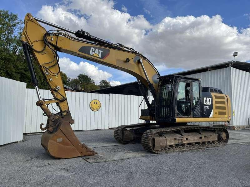 Caterpillar 329ELN - Lánctalpas kotró: 3 kép. Caterpillar 329ELN - Lánctalpas kotró: 3 kép.