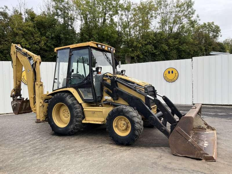 Caterpillar 428C - Kotrórakodó: 1 kép. Caterpillar 428C - Kotrórakodó: 1 kép.