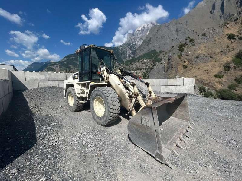 Caterpillar IT14G2 MACHINE SUISSE - Gumikerekes homlokrakodó: 1 kép. Caterpillar IT14G2 MACHINE SUISSE - Gumikerekes homlokrakodó: 1 kép.