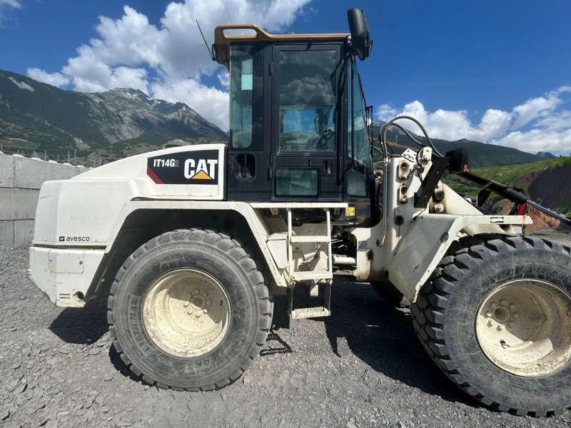 Caterpillar IT14G2 MACHINE SUISSE - Gumikerekes homlokrakodó: 3 kép. Caterpillar IT14G2 MACHINE SUISSE - Gumikerekes homlokrakodó: 3 kép.