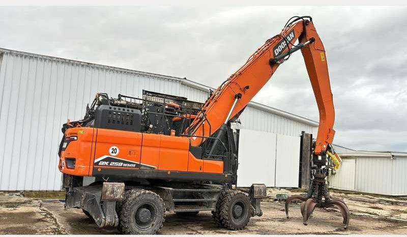 Doosan DX250WMH-7 - Gumikerekes kotró: 1 kép. Doosan DX250WMH-7 - Gumikerekes kotró: 1 kép.