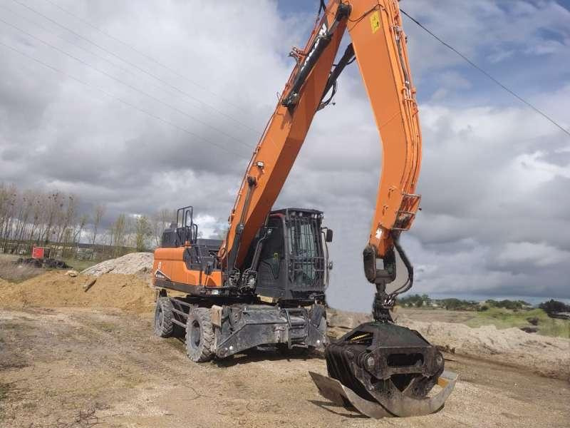 Doosan DX250WMH-7 - Gumikerekes kotró: 5 kép. Doosan DX250WMH-7 - Gumikerekes kotró: 5 kép.