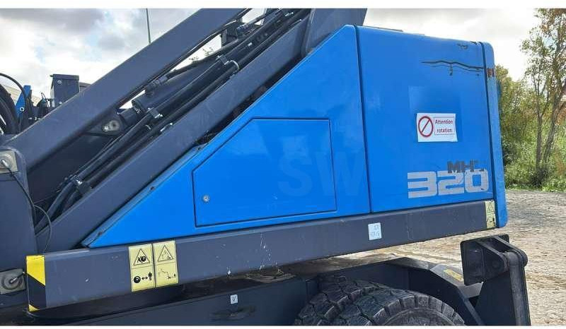 Fuchs MHL320F - Hulladék kotró: 3 kép. Fuchs MHL320F - Hulladék kotró: 3 kép.