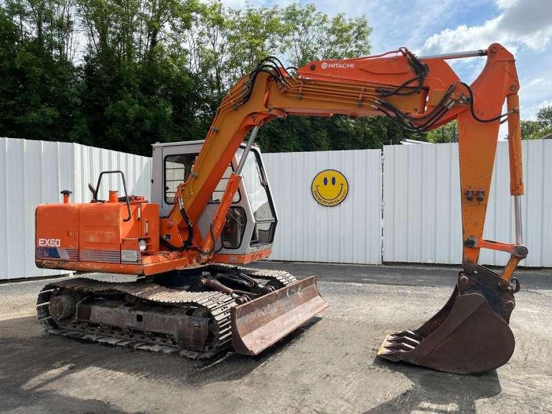 Hitachi EX60 - Lánctalpas kotró: 1 kép. Hitachi EX60 - Lánctalpas kotró: 1 kép.
