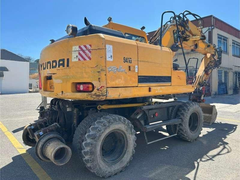 Hyundai ROBEX 140W-7 - Gumikerekes kotró: 2 kép. Hyundai ROBEX 140W-7 - Gumikerekes kotró: 2 kép.