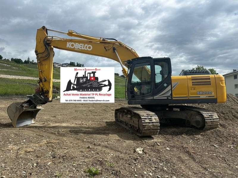 Kobelco SK210LC-11 - Lánctalpas kotró: 1 kép. Kobelco SK210LC-11 - Lánctalpas kotró: 1 kép.