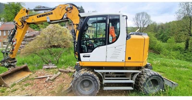 Liebherr A912 COMPACT - Gumikerekes kotró: 3 kép. Liebherr A912 COMPACT - Gumikerekes kotró: 3 kép.