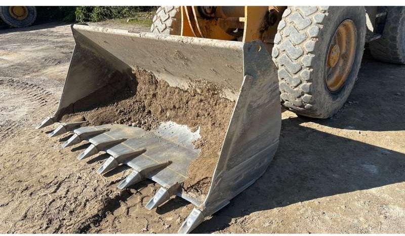 Liebherr L514 - Gumikerekes homlokrakodó: 3 kép. Liebherr L514 - Gumikerekes homlokrakodó: 3 kép.