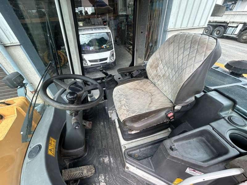 Gumikerekes homlokrakodó Liebherr L514 Stereo: 29 kép.