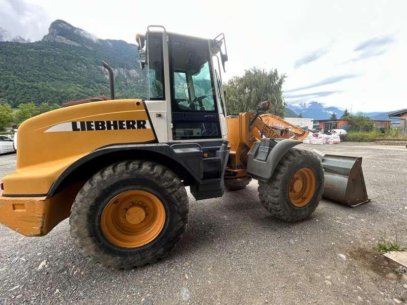 Gumikerekes homlokrakodó Liebherr L514 Stereo: 9 kép.