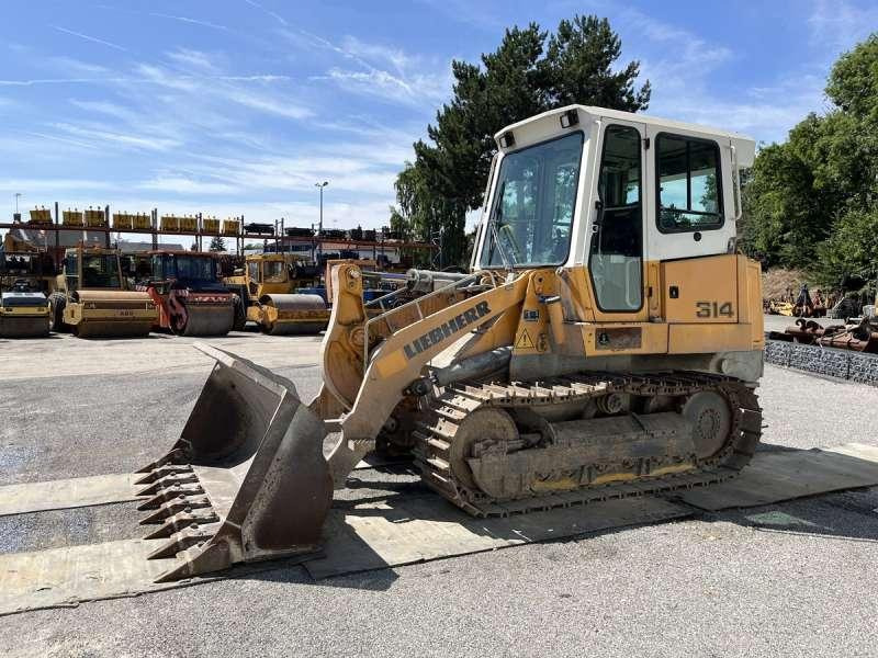 Liebherr LR614 - Lánctalpas homlokrakodó: 3 kép. Liebherr LR614 - Lánctalpas homlokrakodó: 3 kép.