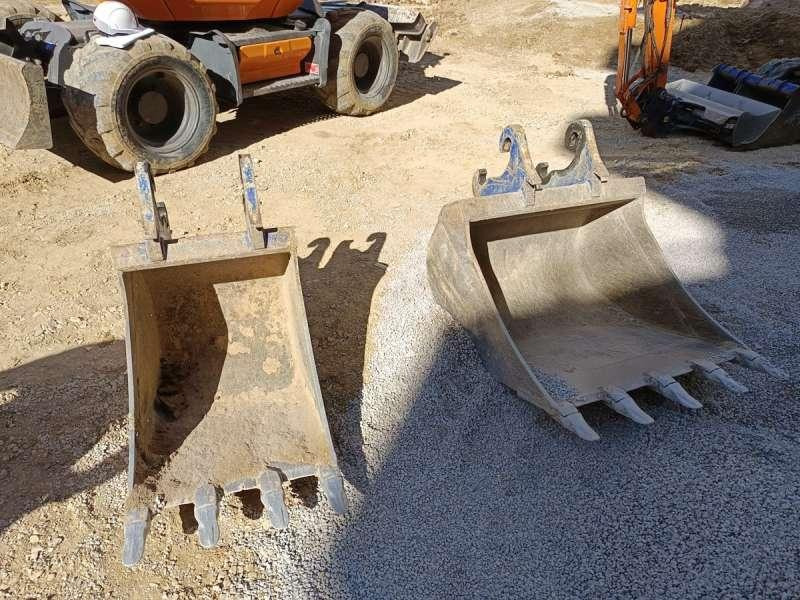 Gumikerekes kotró Mecalac 9MWR: 11 kép.