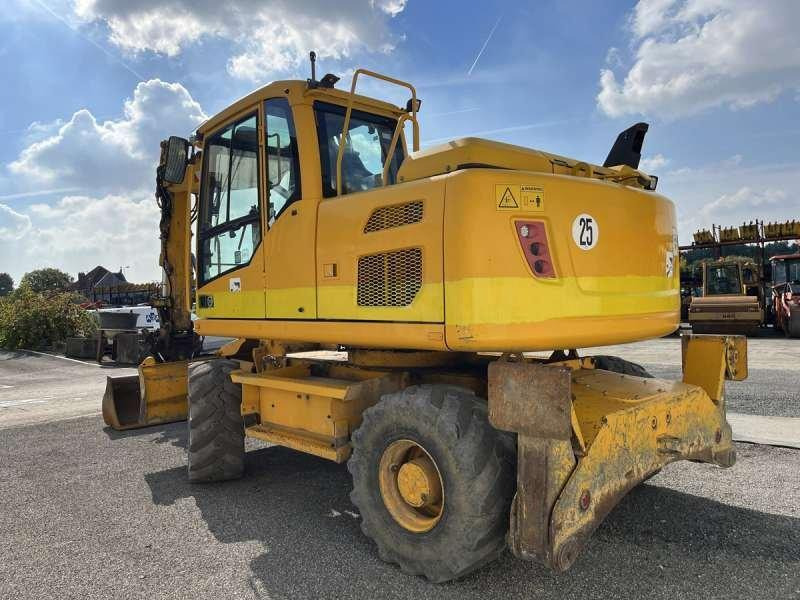 Volvo EW140D - Gumikerekes kotró: 5 kép. Volvo EW140D - Gumikerekes kotró: 5 kép.