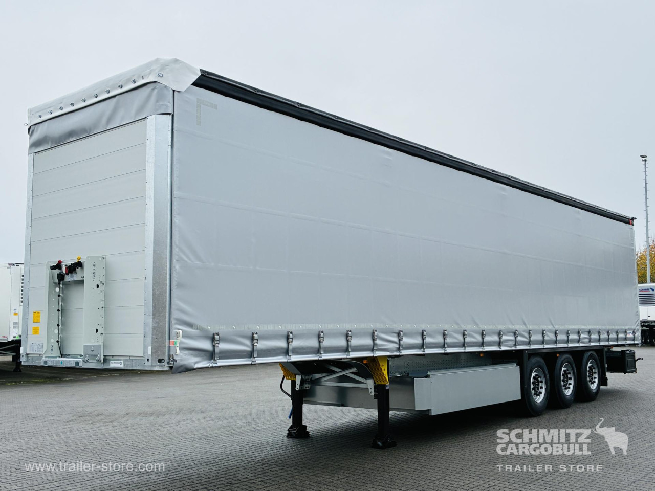 SCHMITZ Auflieger Curtainsider Standard - Ponyvás félpótkocsi: 1 kép. SCHMITZ Auflieger Curtainsider Standard - Ponyvás félpótkocsi: 1 kép.
