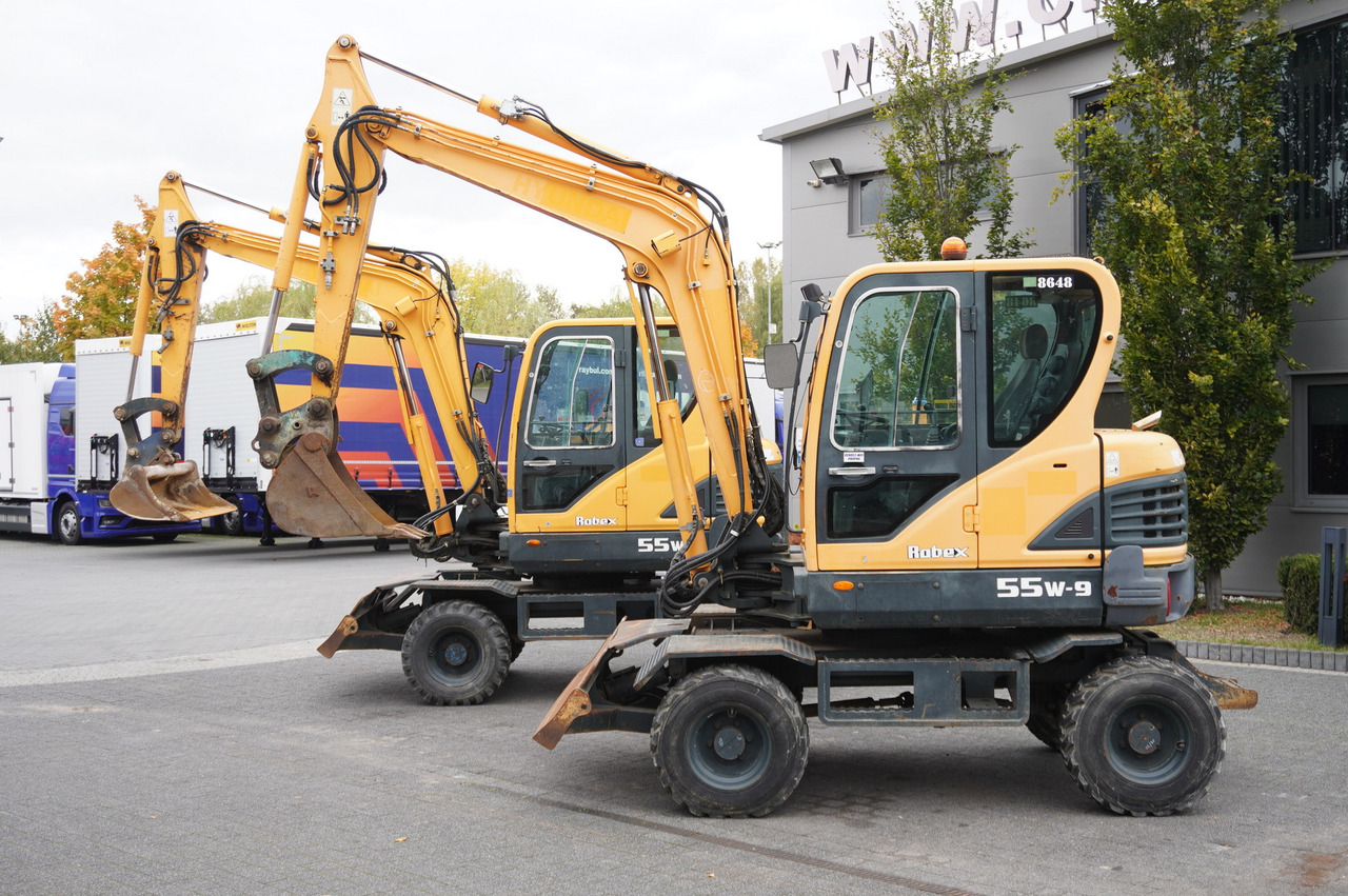 Hyundai Robex 55W-9 Wheeled Excavator 5.5t / 2pcs - Minikotró: 1 kép. Hyundai Robex 55W-9 Wheeled Excavator 5.5t / 2pcs - Minikotró: 1 kép.