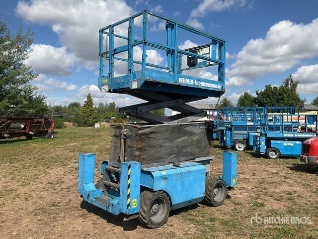 2007 Genie GS2668RT 4x4 Diesel Scissor Lift - Ollós emelő: 2 kép. 2007 Genie GS2668RT 4x4 Diesel Scissor Lift - Ollós emelő: 2 kép.