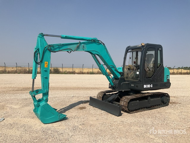 Kobelco SK60-C Tracked Excavator - Lánctalpas kotró: 1 kép. Kobelco SK60-C Tracked Excavator - Lánctalpas kotró: 1 kép.