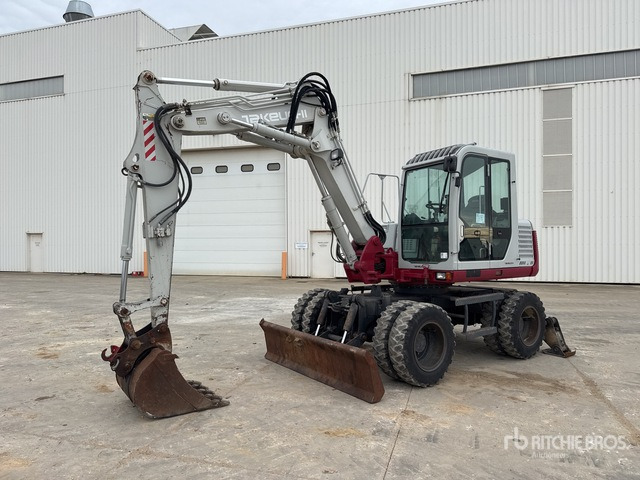 2007 Takeuchi TB175 Pelle Sur Pneus Wheel Excavator - Gumikerekes kotró: 2 kép. 2007 Takeuchi TB175 Pelle Sur Pneus Wheel Excavator - Gumikerekes kotró: 2 kép.