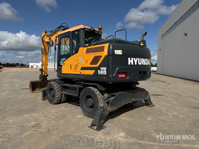 2020 Hyundai HW140 Pelle Sur Pneus Wheel Excavator - Gumikerekes kotró: 2 kép. 2020 Hyundai HW140 Pelle Sur Pneus Wheel Excavator - Gumikerekes kotró: 2 kép.