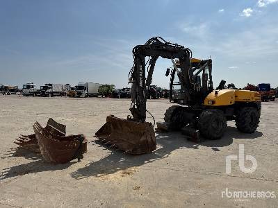 MECALAC 12MTX Pelle Sur Pneus - Gumikerekes kotró: 4 kép. MECALAC 12MTX Pelle Sur Pneus - Gumikerekes kotró: 4 kép.