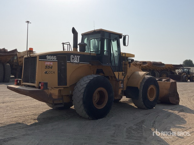 2001 Cat 966G - Gumikerekes homlokrakodó: 4 kép. 2001 Cat 966G - Gumikerekes homlokrakodó: 4 kép.