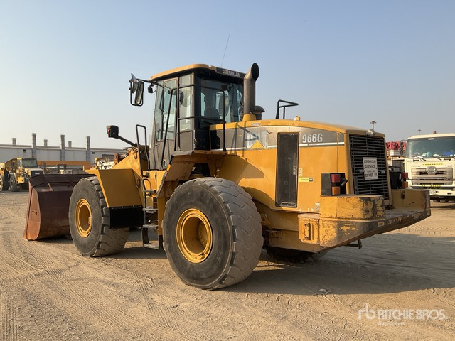 2004 Cat 966G Series II Wheel Loader - Gumikerekes homlokrakodó: 3 kép. 2004 Cat 966G Series II Wheel Loader - Gumikerekes homlokrakodó: 3 kép.