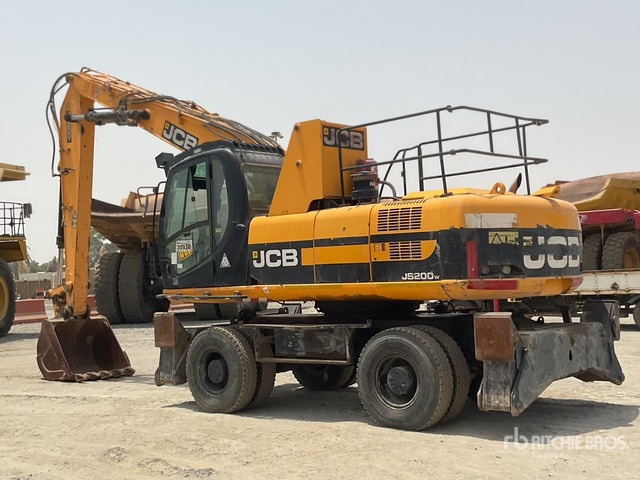 2011 JCB JS200WHRC - Gumikerekes kotró: 4 kép. 2011 JCB JS200WHRC - Gumikerekes kotró: 4 kép.