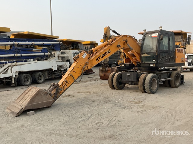 Hyundai Robex 140W-7 - Gumikerekes kotró: 3 kép. Hyundai Robex 140W-7 - Gumikerekes kotró: 3 kép.