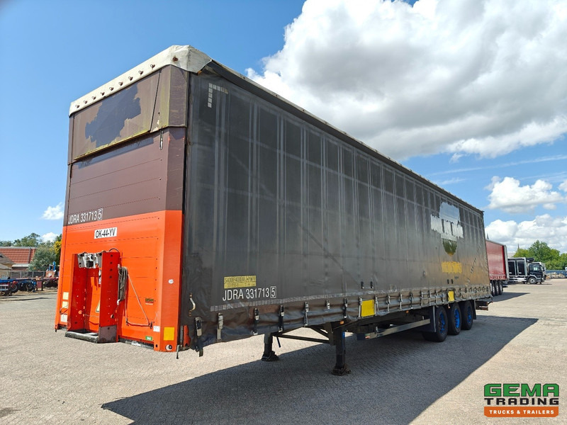 Schmitz Cargobull SCS 24/L - 13.62 E B (S01) 3-Assen SAF - MEGA - Schuifzeilen/Hef/SchuifDak - Gegalvaniseerd - Schijfremmen - Ponyvás félpótkocsi: 2 kép. Schmitz Cargobull SCS 24/L - 13.62 E B (S01) 3-Assen SAF - MEGA - Schuifzeilen/Hef/SchuifDak - Gegalvaniseerd - Schijfremmen - Ponyvás félpótkocsi: 2 kép.