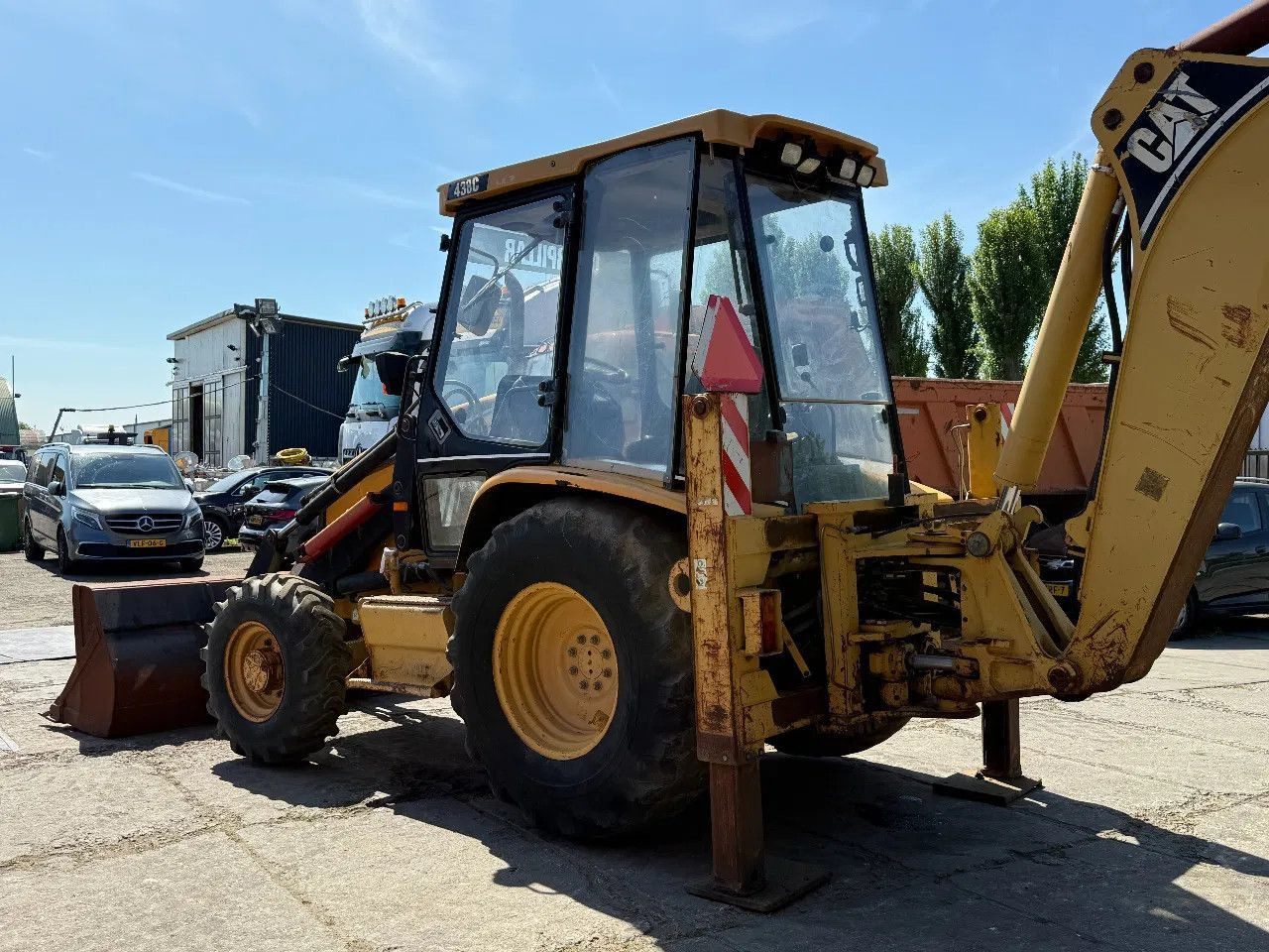 CAT 438C 4X4 Backhoe Loader - Kotrórakodó: 3 kép. CAT 438C 4X4 Backhoe Loader - Kotrórakodó: 3 kép.
