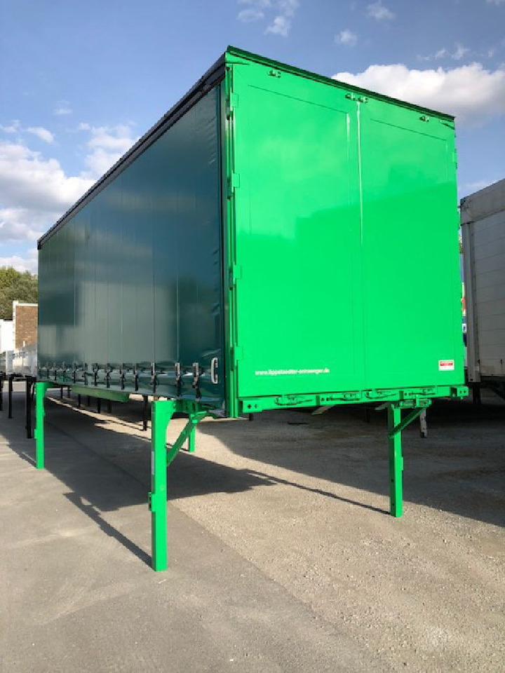 Kögel BDF-System, 7.450 mm lang - Ponyvás felépítmény: 1 kép. Kögel BDF-System, 7.450 mm lang - Ponyvás felépítmény: 1 kép.